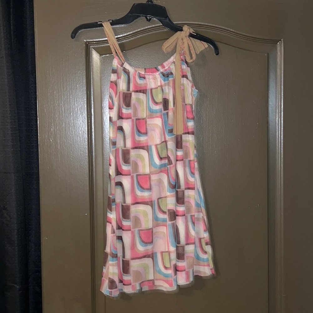 Sweet pea patterned sleeveless top